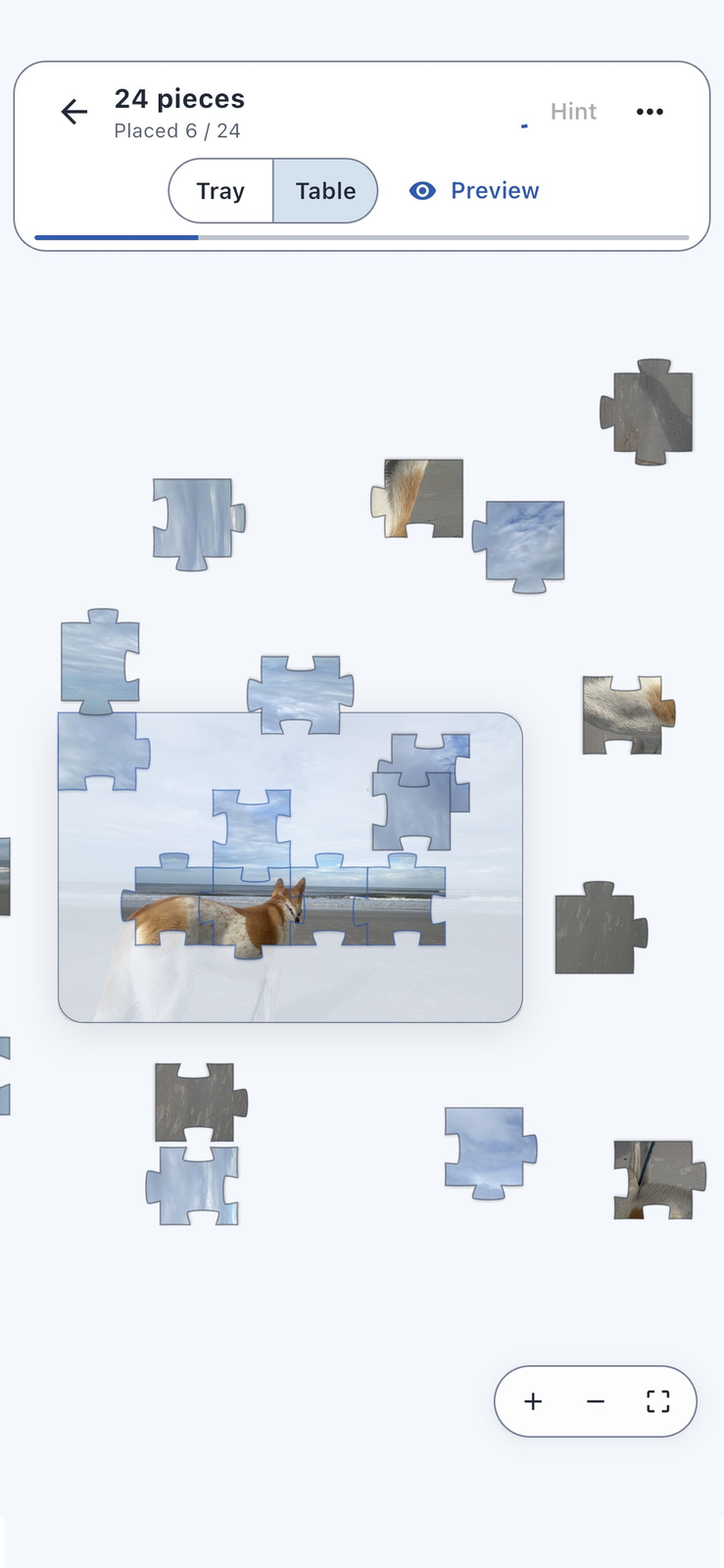 Interactive puzzle canvas with piece rotation, zoom controls, and custom tray management.